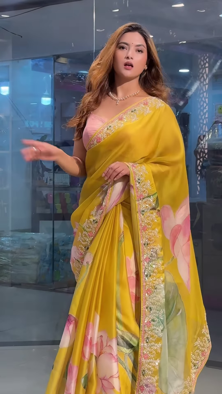 yellow tussar saree with handwork floral border