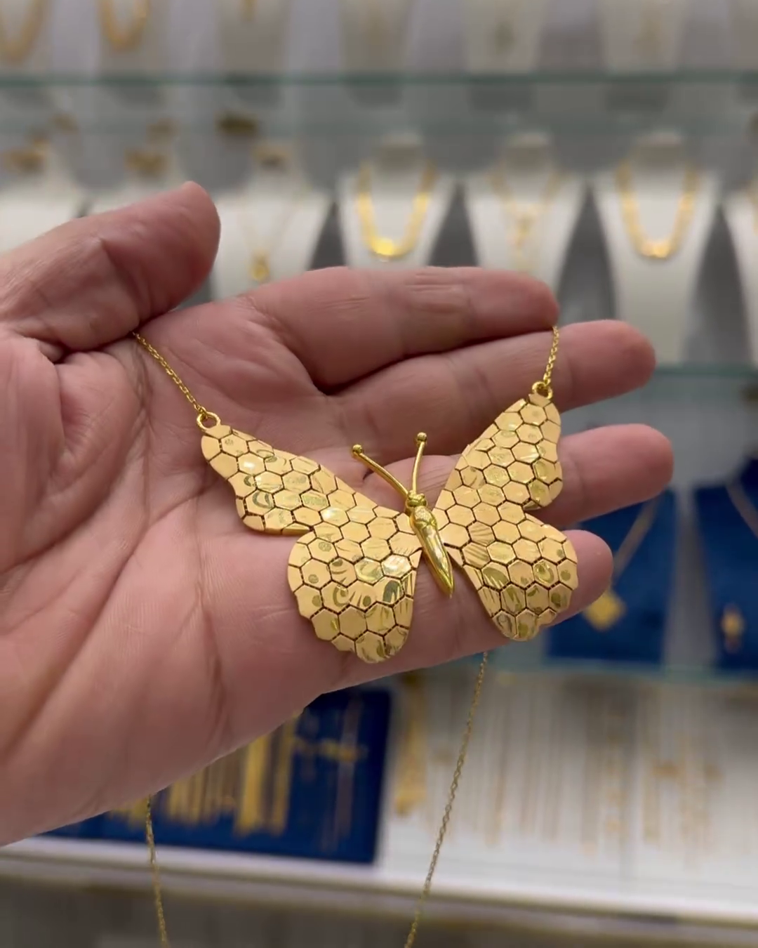 elegant butterfly pendant necklace – intricately designed gold tone jewelry for women