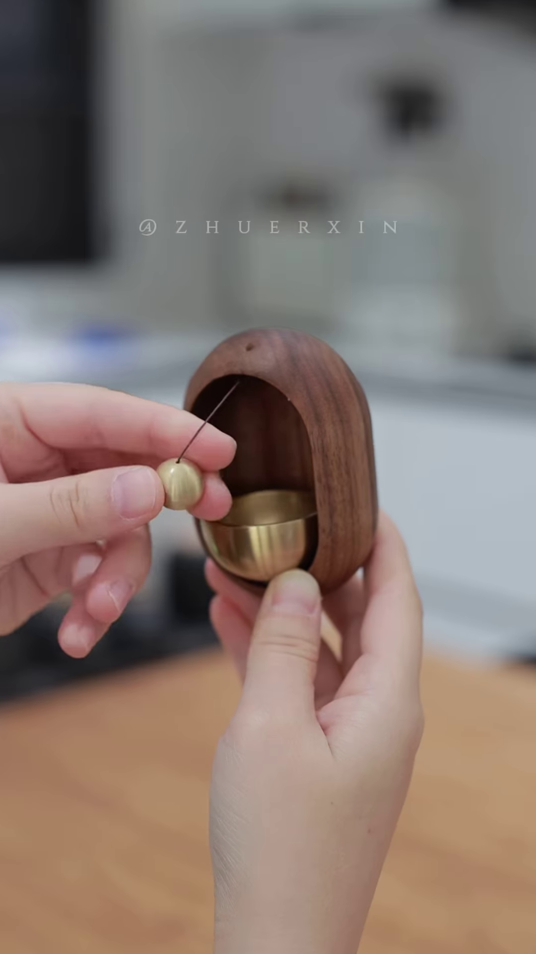 “handcrafted walnut meditation bell – minimalist wooden chime with brass striker for mindfulness practice”