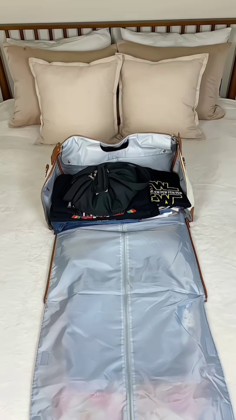 elegant weekend duffle bag: luxurious cream and tan leather travel tote with classic design