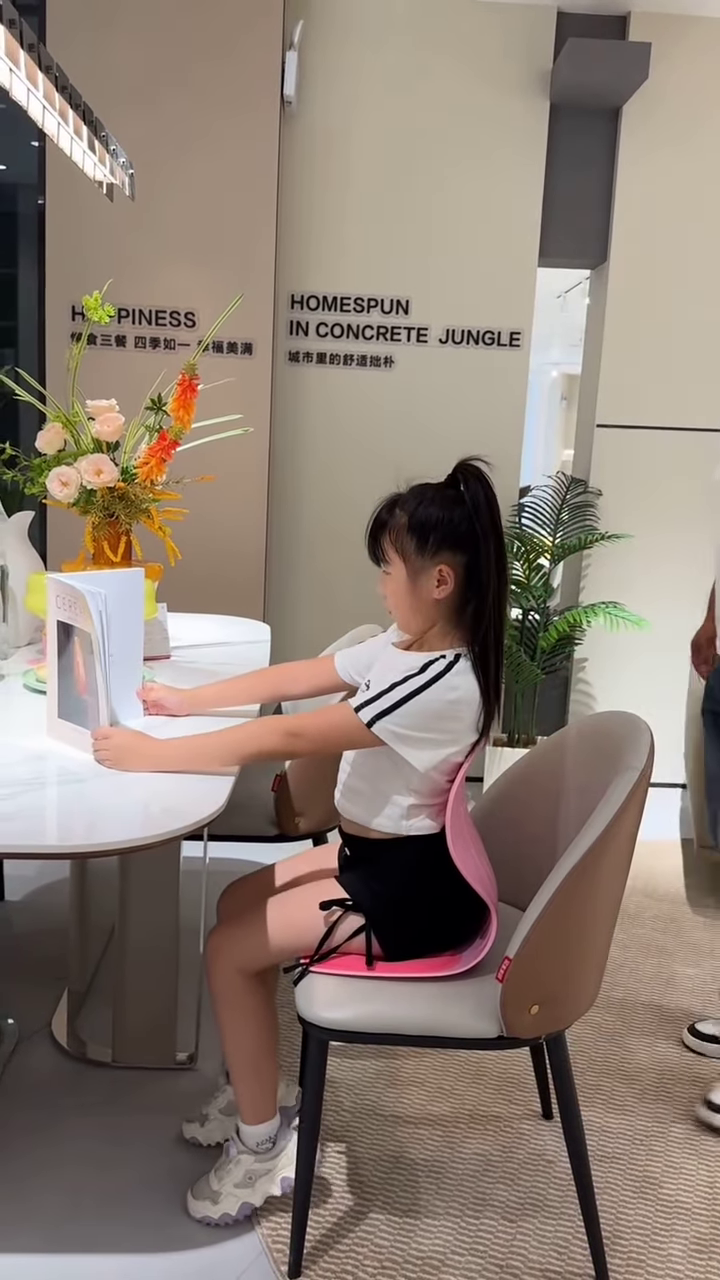 ergonomic children’s posture booster seat: pink adjustable study cushion for proper sitting position