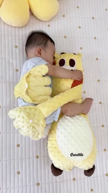 soft plush baby sleep pillow with attached arms – comfort and security for infants