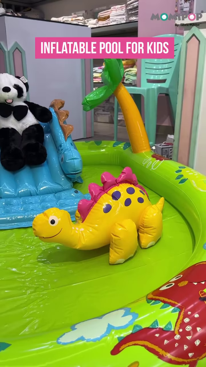 kids’ inflatable play pool with slide and fun animal graphics
