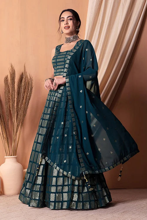 bollywood design teal blue embroidered lehenga set.jpg