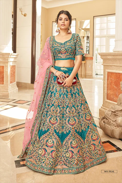 designer teal velvet lehenga front view.jpg
