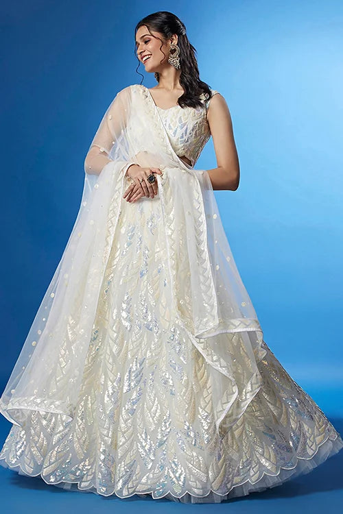 white soft net lehenga with thread embroidery design.jpg