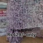 elegant purple net saree with intricate design