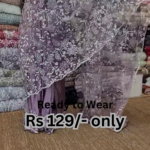elegant purple net saree with intricate design