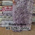 elegant purple net saree with intricate design