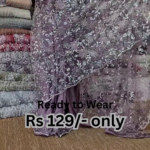elegant purple net saree with intricate design